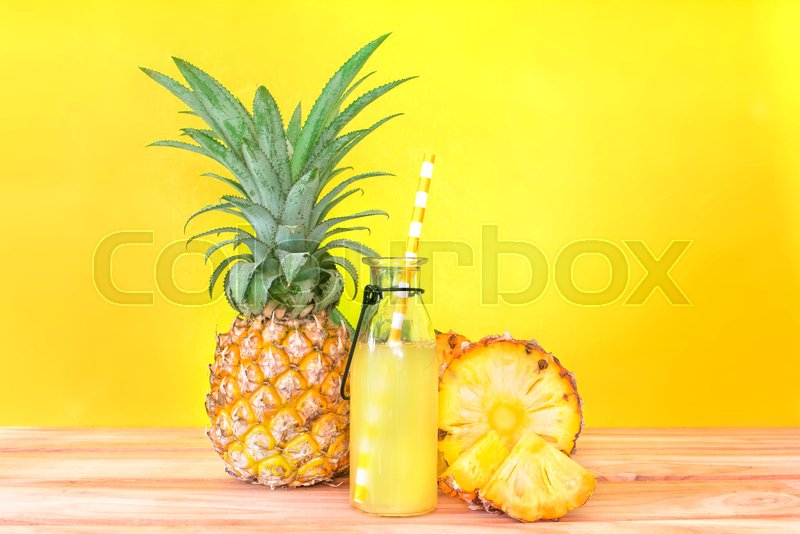 The Bottles of pineapple juice with ... | Stock image | Colourbox