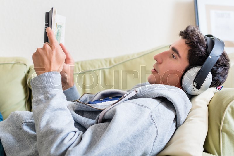 Relaxed Young Man Lying Down On The Stock Image Colourbox