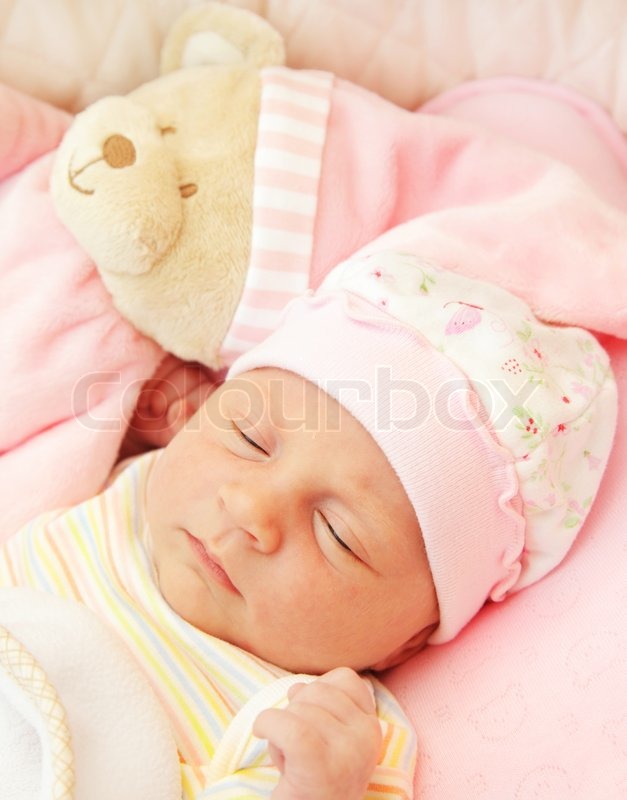 cute baby sleeping with teddy