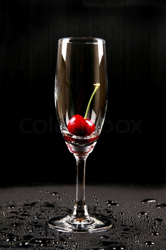 Cherry in a glass | Stock Photo | Colourbox