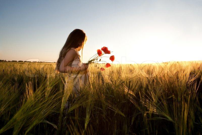 girl in field sunset