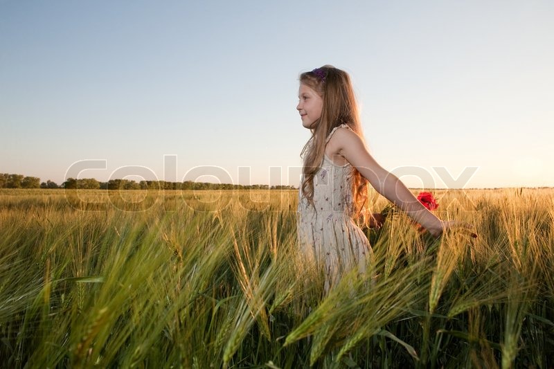 girl in field sunset