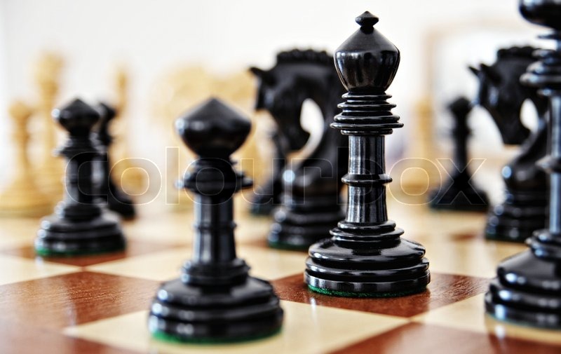 chess pieces on wood
