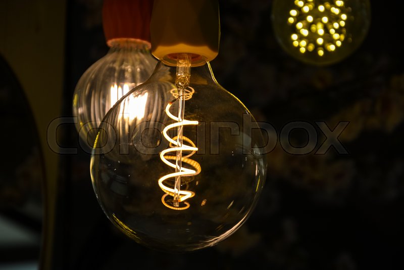 Several Lit Lightbulbs Hanging From The Stock Image Colourbox