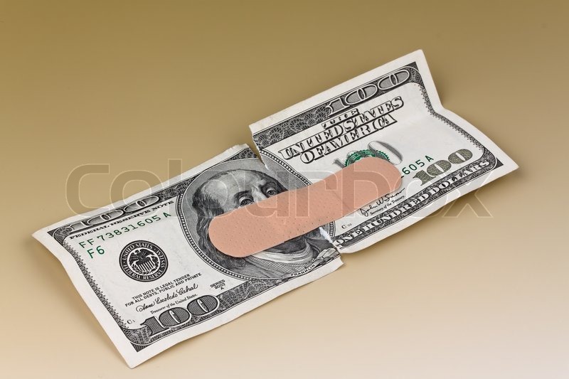 Many dollar bills with a bandaid Stock image Colourbox