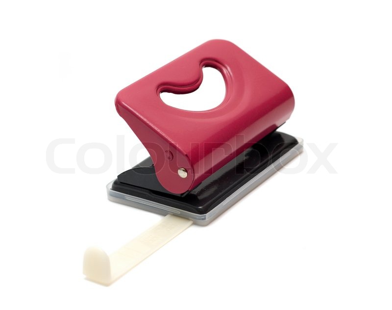 Hole puncher with a ruler isolated on Stock image Colourbox