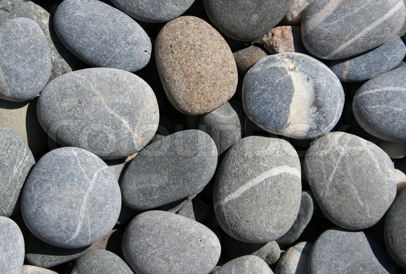grey pebbles on the beach can use as background stock photo