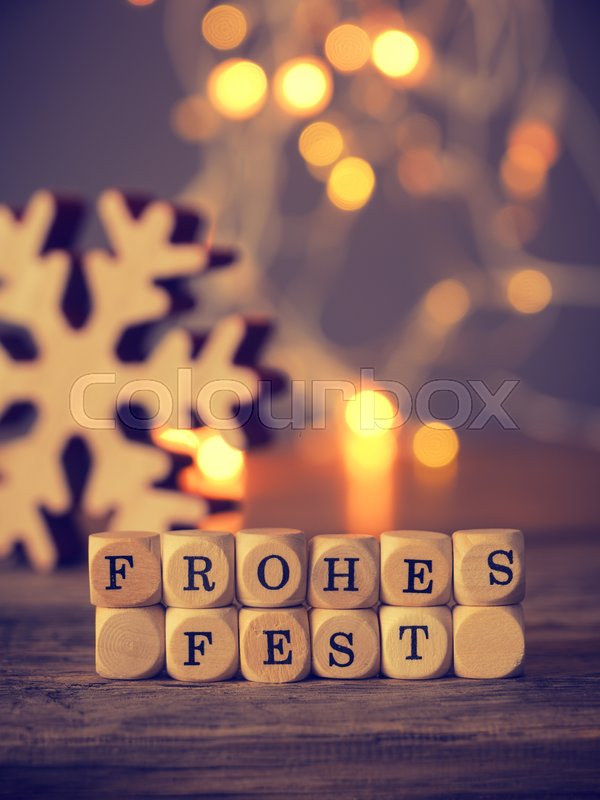 German Merry Christmas on wooden dices | Stock image | Colourbox