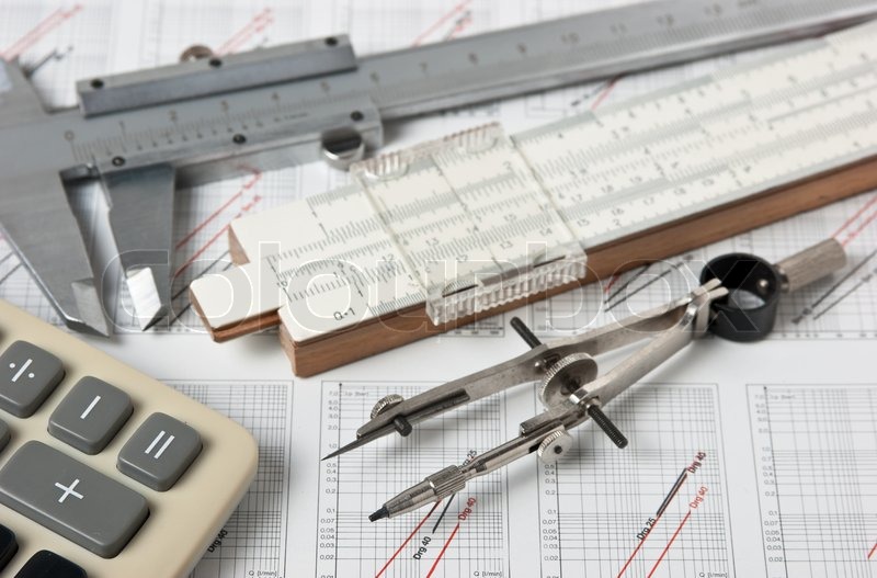 Engineering tools on a technical drawing Stock Photo Colourbox