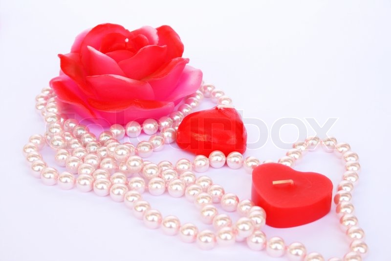 heart and rose shape red candles necklace isolated on grey