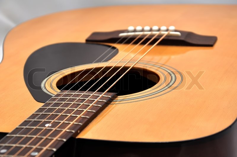Acoustic guitar on a white background | Stock image | Colourbox