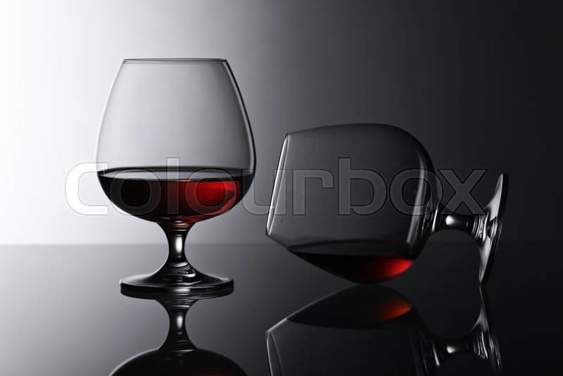 Two snifters of brandy on the Stock image Colourbox