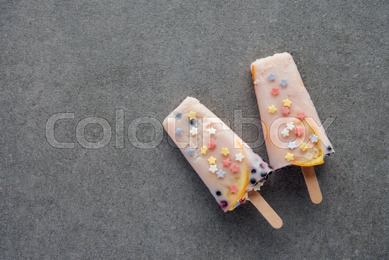 Download Top view of delicious cold popsicles on ... | Stock image ... Yellowimages Mockups