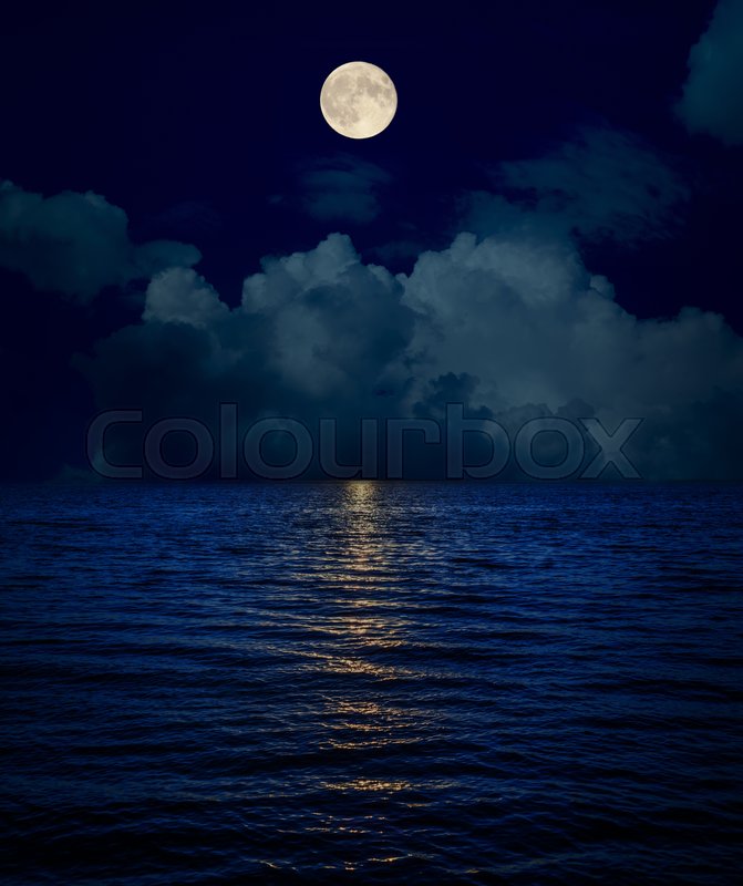 Full Moon Over Clouds And Dark Water Stock Image Colourbox