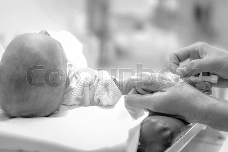 Newborn baby in hospital. | Stock image | Colourbox