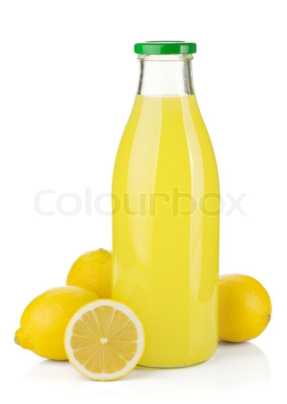 Bottle of lemon juice and fresh lemons Stock Photo Colourbox