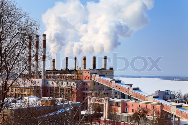 Large factory with smoking chimneys Stock image