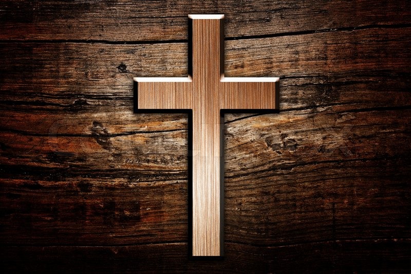 Cross on wood background | Stock Photo | Colourbox