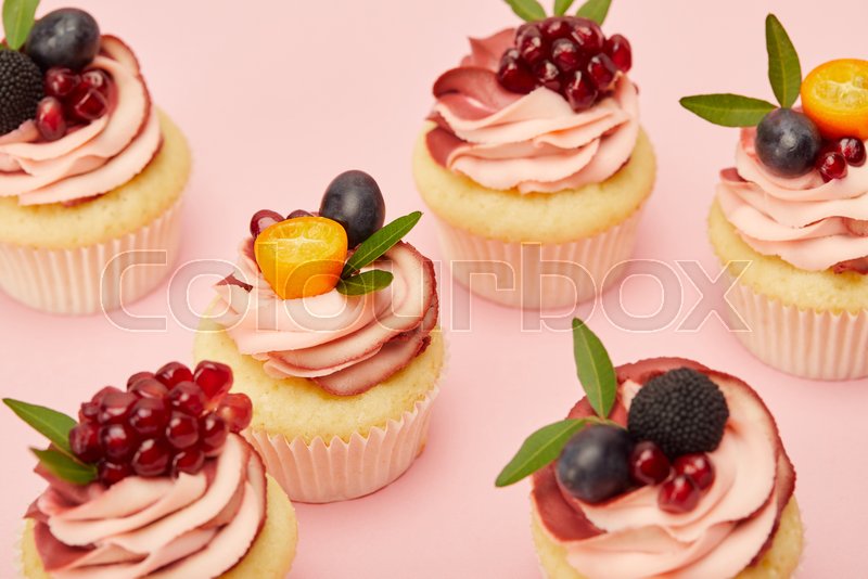 Sweet cupcakes with fruits and berries Stock image Colourbox