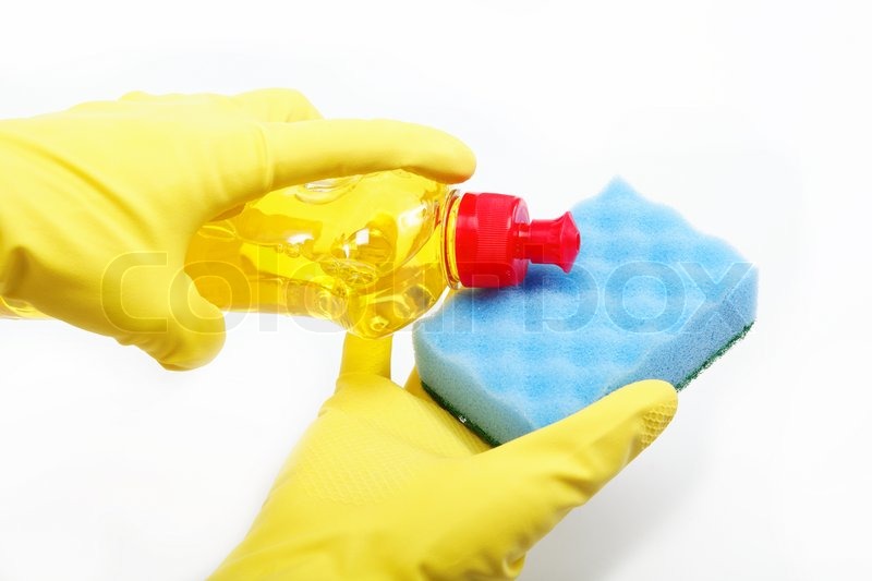 Hands in rubber gloves with a bottle of Stock image Colourbox