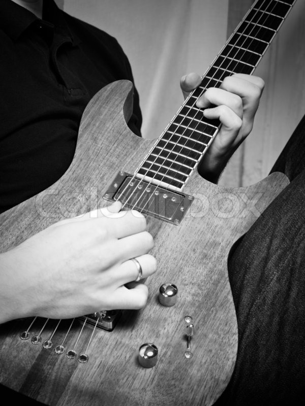 Playing guitar | Stock image | Colourbox