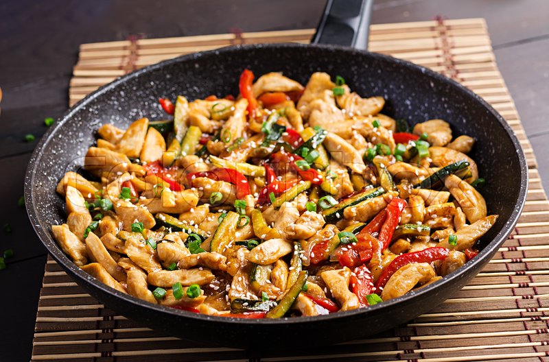 Stir fry chicken, zucchini, sweet Stock image Colourbox