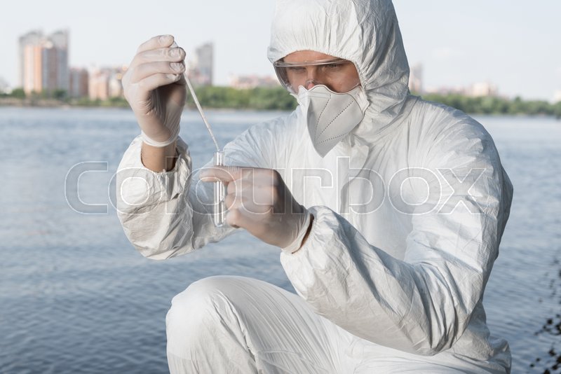 Water inspector in protective costume Stock image Colourbox
