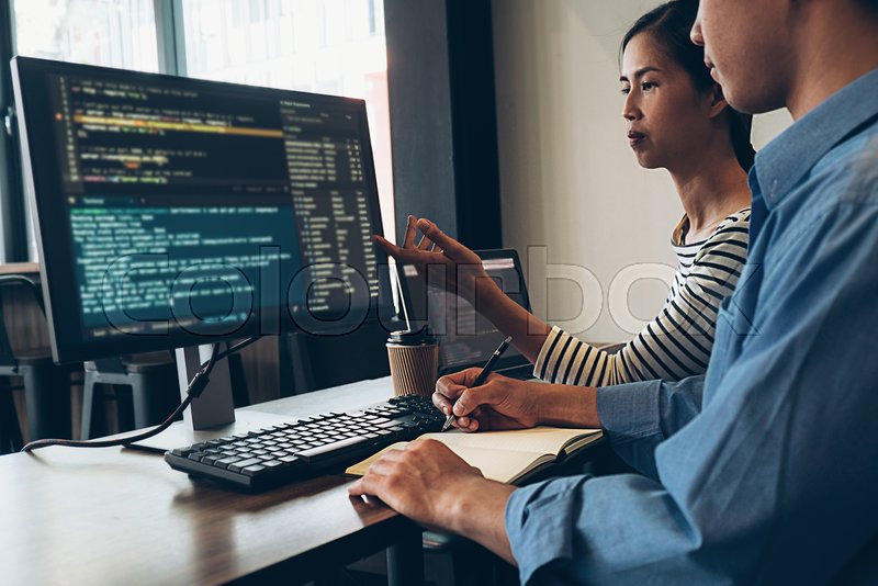 Programmer working in a software ... | Stock image | Colourbox