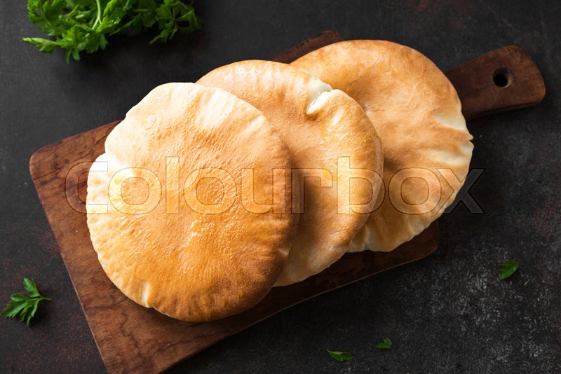 Arabic Pita Flat Bread on dark rustic Stock image Colourbox