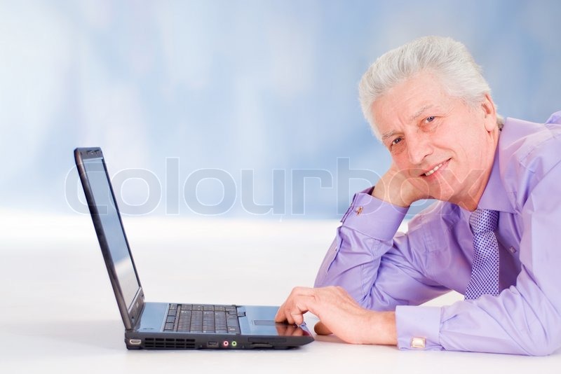 Old Guy With Computer Stock Image Colourbox