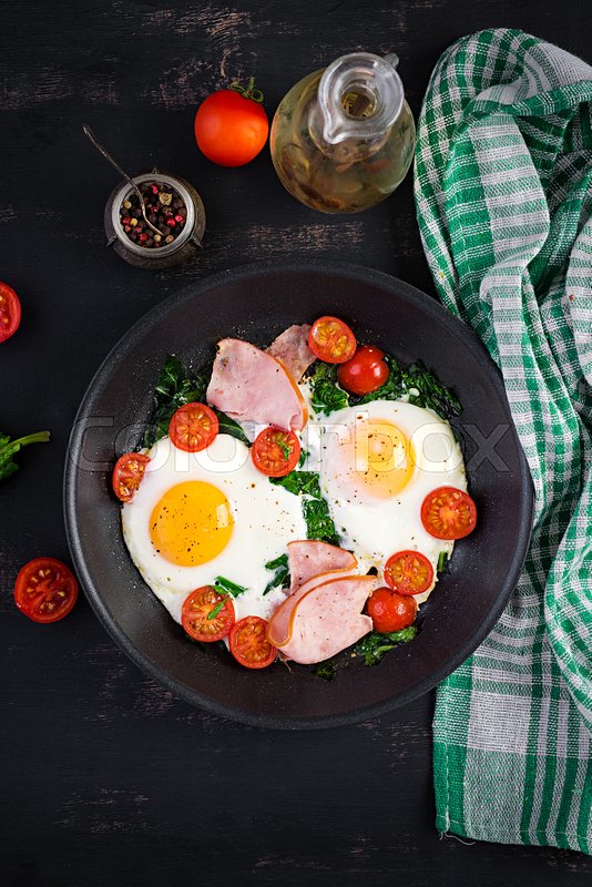Plate with a keto diet food. Fried egg, Stock image Colourbox