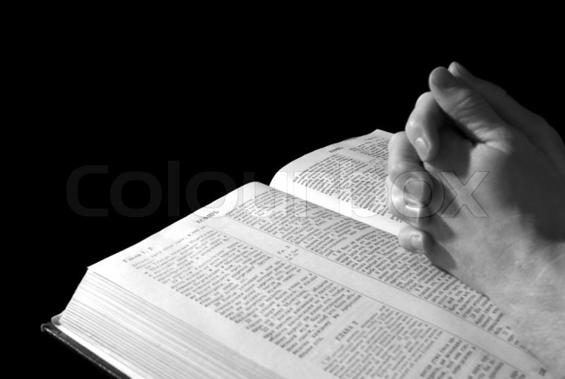 Hands on Bible Stock image Colourbox