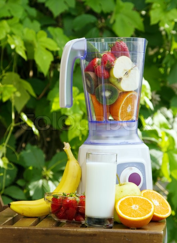 Electric blender with fruits in it Stock image Colourbox