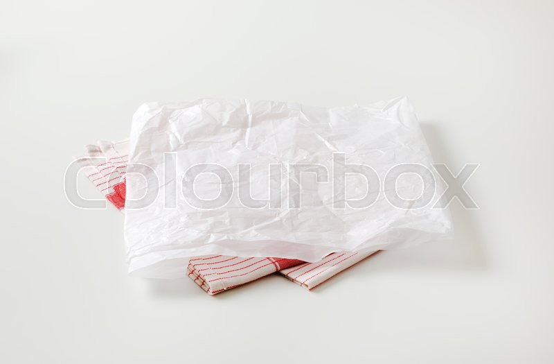Creased sheet of white wax paper | Stock image | Colourbox