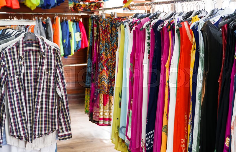 Interior in a summer clothing store. Stock image Colourbox