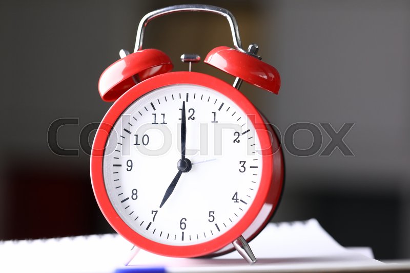 Close up table red alarm clock meeting Stock image Colourbox