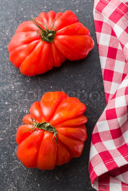 Coeur De Boeuf. Beefsteak tomatoes on | Stock image | Colourbox