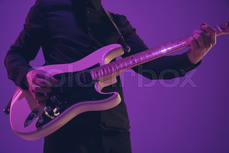 Young and joyful caucasian musician | Stock image | Colourbox