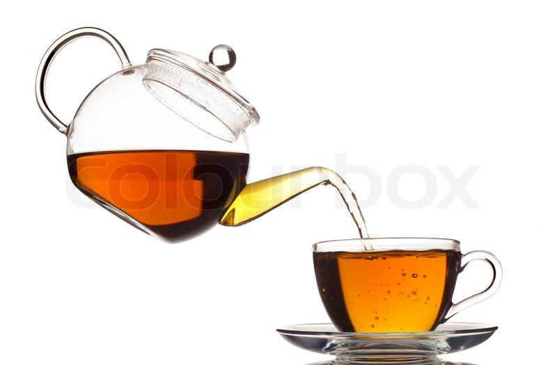 Tea pouring in the cup isolated on white Stock Photo Colourbox