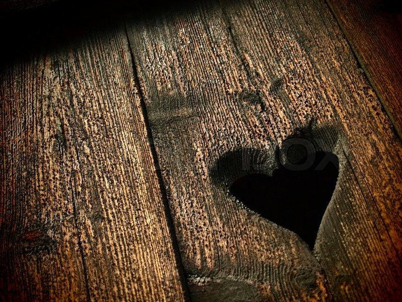 Heart carved in wood | Stock Photo | Colourbox