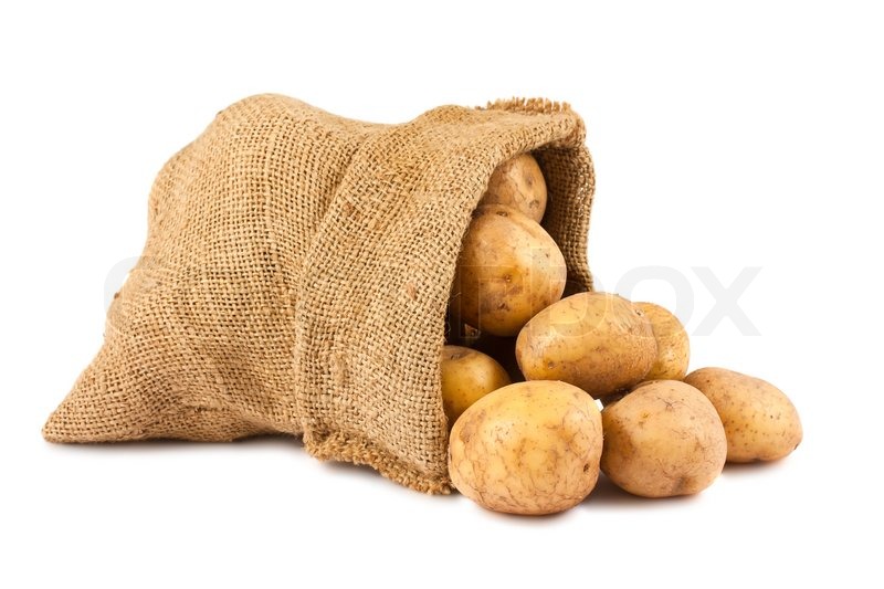 Raw potatoes in burlap sack Stock Photo Colourbox