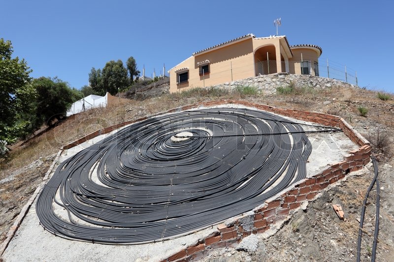 Solar water heating system with black pipe Stock Photo Colourbox