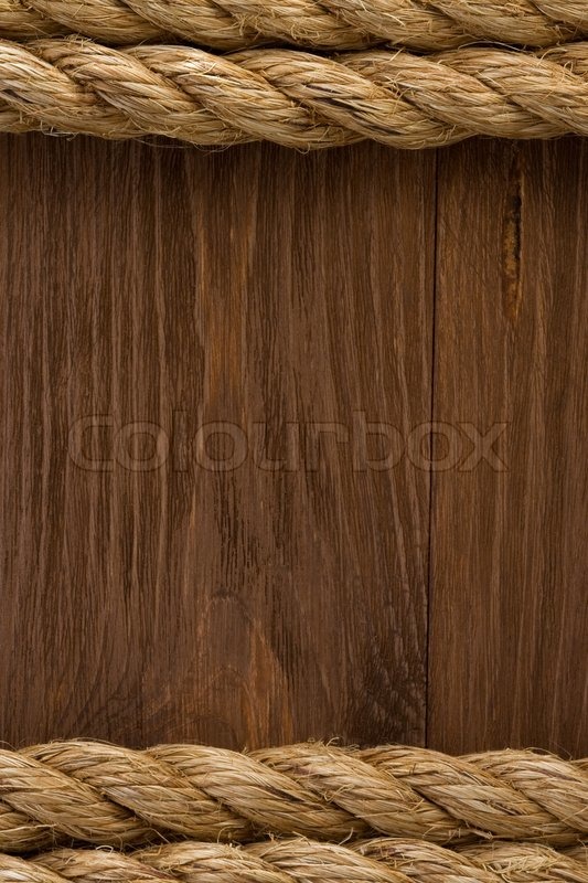 Ropes on wood background | Stock Photo | Colourbox