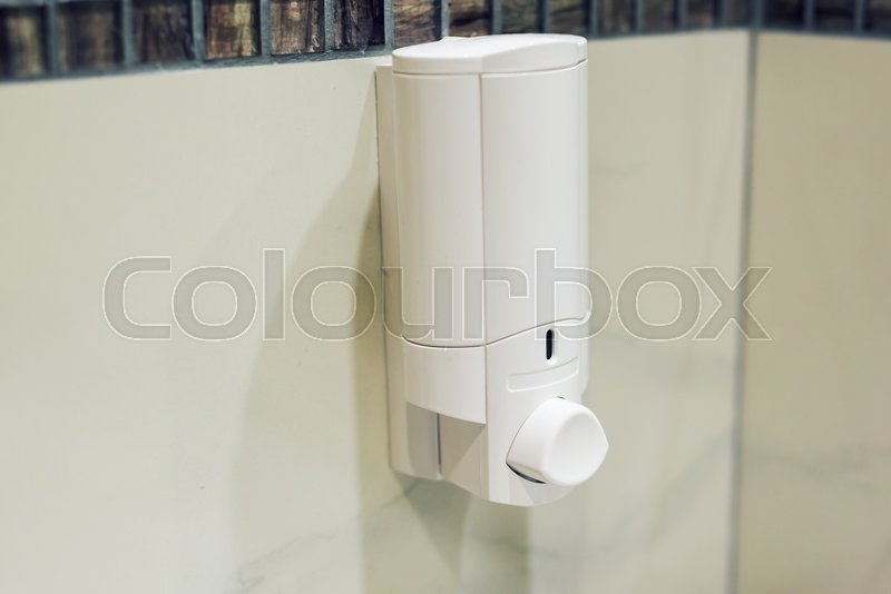 Automatic Soap Dispenser in toilet at Stock image Colourbox