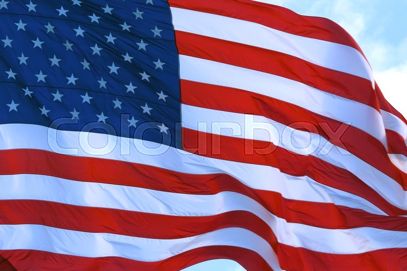 American flag waving proudly in the Stock image Colourbox