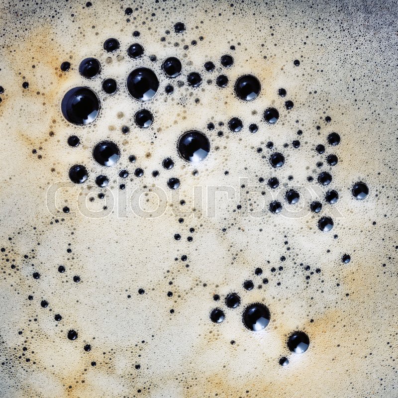 Closeup coffee foam with bubbles. Top Stock image Colourbox