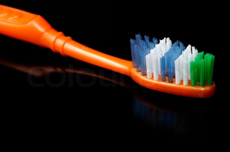 Toothbrush On A Blue Background Toothbrush On Black Background Stock Image Colourbox
