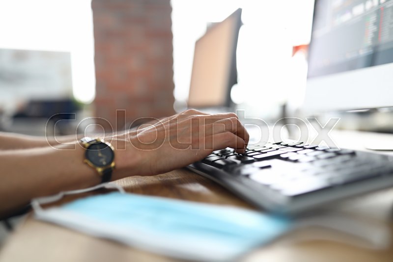 Female hands using computer during ... | Stock image | Colourbox
