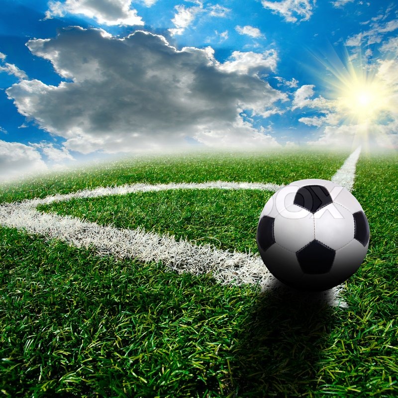 Soccer ball on the field Stock Photo Colourbox