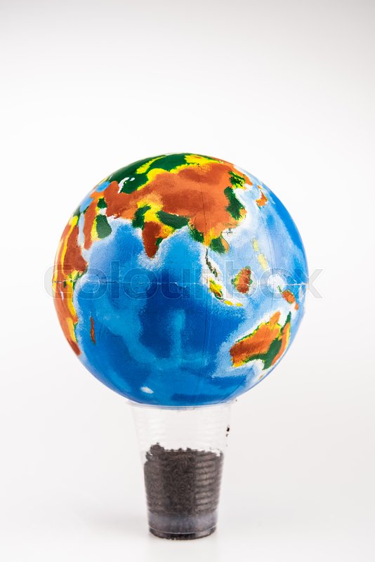 Globe on plastic cup with ground on ... | Stock image | Colourbox